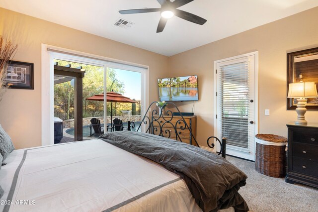 bedroom with access to outside, ceiling fan, and carpet floors