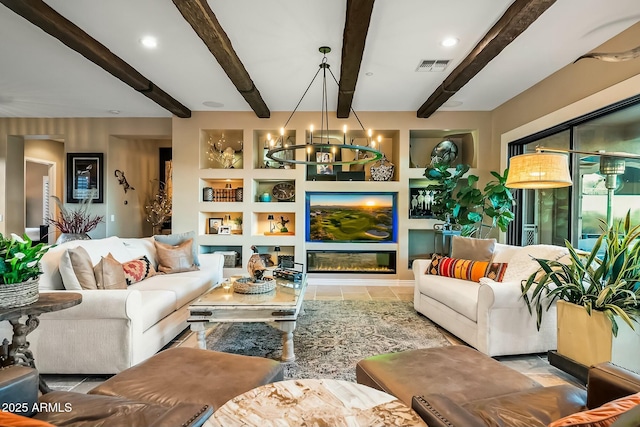 living room with built in shelves, an inviting chandelier, and beam ceiling