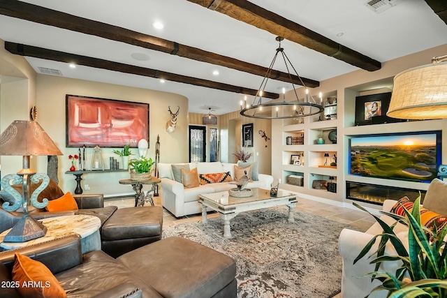 living room with beam ceiling, built in features, and an inviting chandelier