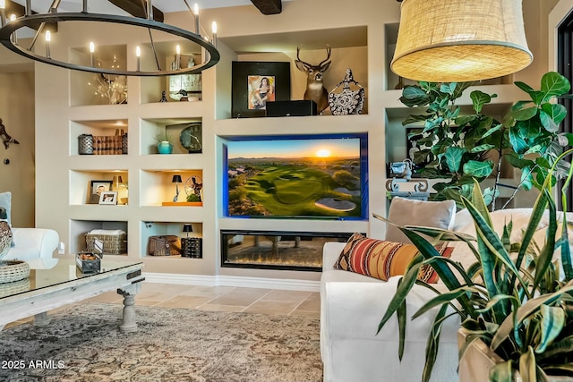 sitting room with built in shelves