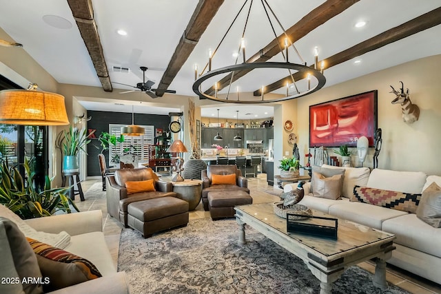 living room with beam ceiling and ceiling fan with notable chandelier