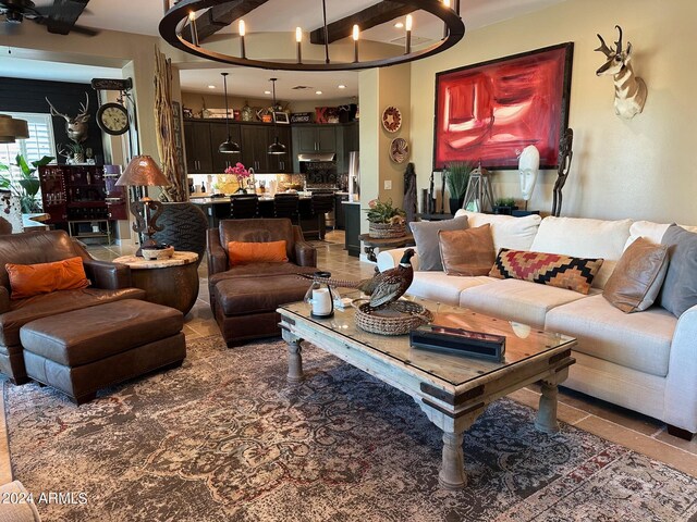 living room featuring beam ceiling