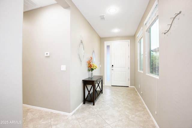 9295 W Wood Dr, Peoria, AZ 85381 - hallway featuring light tile patterned flooring, baseboards, and visible vents
