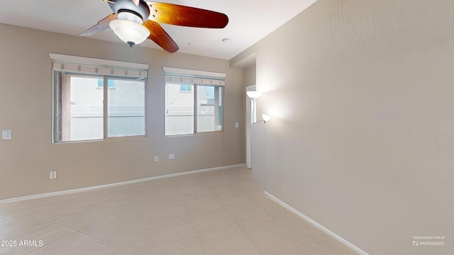 9295 W Wood Dr, Peoria, AZ 85381 - unfurnished room featuring a ceiling fan and baseboards
