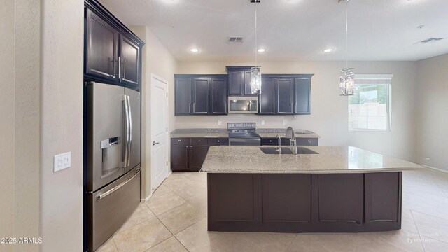 9295 W Wood Dr, Peoria, AZ 85381 - kitchen featuring visible vents, a sink, decorative light fixtures, recessed lighting, and appliances with stainless steel finishes
