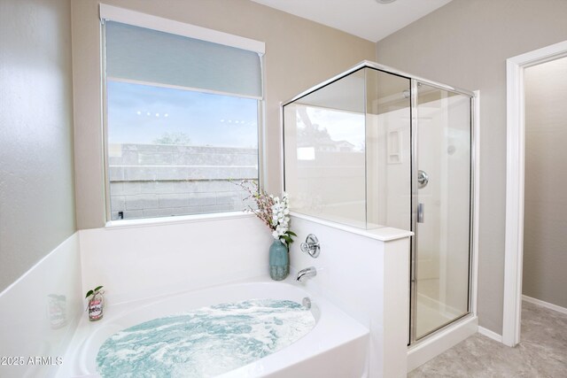 9295 W Wood Dr, Peoria, AZ 85381 - bathroom featuring a bath and a stall shower