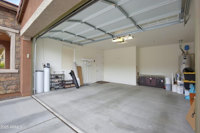 9295 W Wood Dr, Peoria, AZ 85381 - garage with a garage door opener and water heater