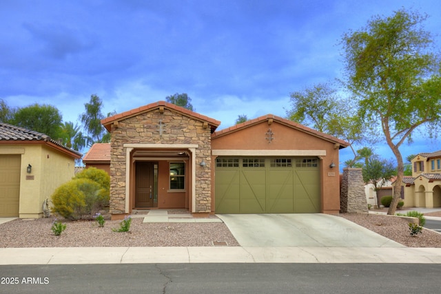 9295 W Wood Dr, Peoria, AZ 85381 - view of front of home with concrete driveway, a tile roof, stucco siding, a garage, and stone siding