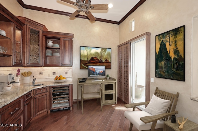 bar with crown molding, light stone countertops, dark hardwood / wood-style flooring, a healthy amount of sunlight, and wine cooler