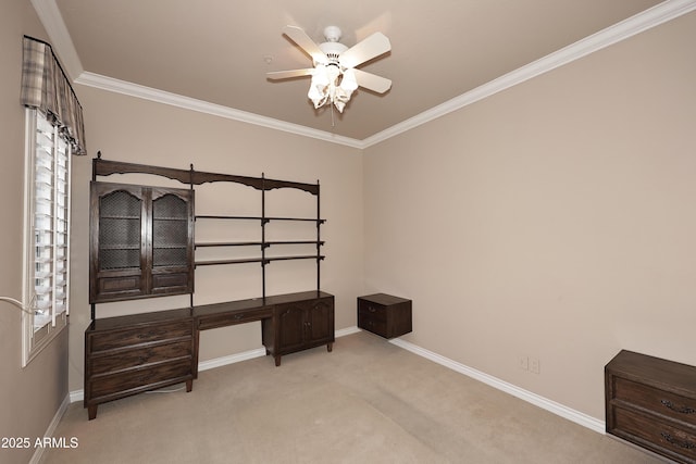 bedroom featuring crown molding, light colored carpet, and ceiling fan