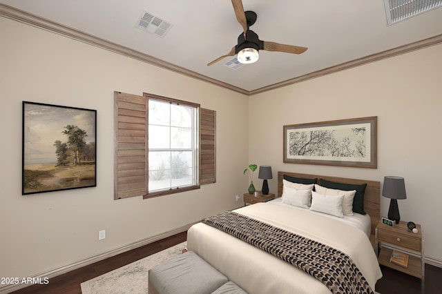 bedroom featuring ceiling fan, ornamental molding, and dark wood-type flooring