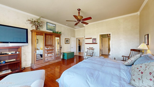 bedroom featuring a ceiling fan, crown molding, and wood finished floors