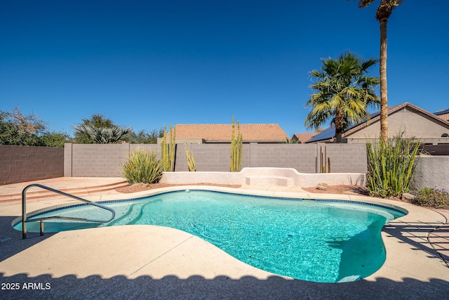 view of swimming pool featuring a patio, a fenced backyard, and a fenced in pool