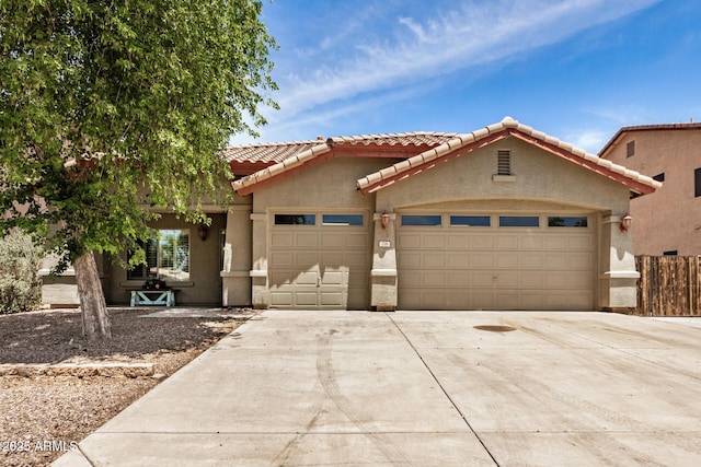 726 E Heather Dr, San Tan Valley, AZ 85140 - view of front of home with a garage, a tile roof, concrete driveway, and stucco siding