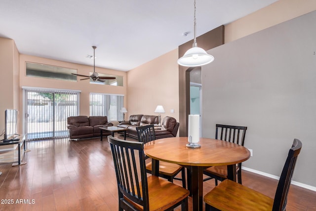 726 E Heather Dr, San Tan Valley, AZ 85140 - dining area featuring ceiling fan, dark wood finished floors, baseboards, and a towering ceiling