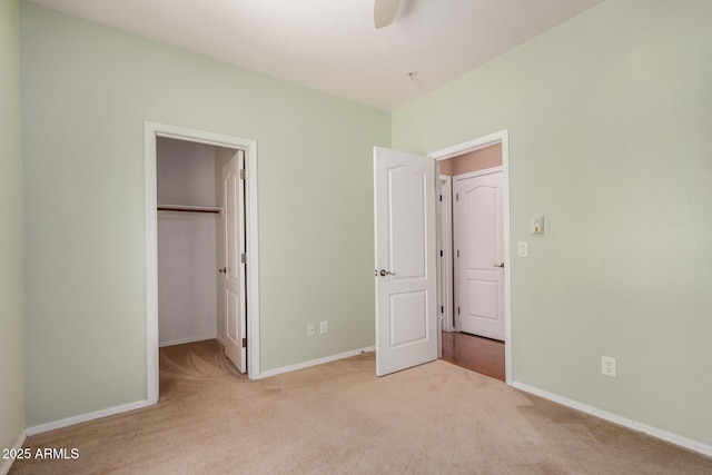 726 E Heather Dr, San Tan Valley, AZ 85140 - unfurnished bedroom with carpet flooring, baseboards, and a spacious closet
