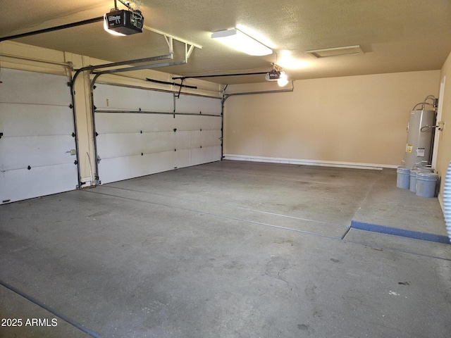 garage with a garage door opener and water heater