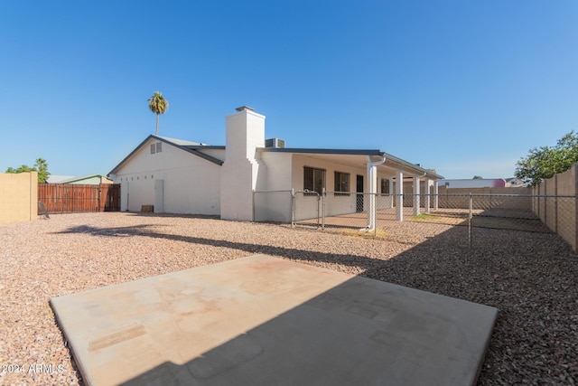 back of house featuring a patio