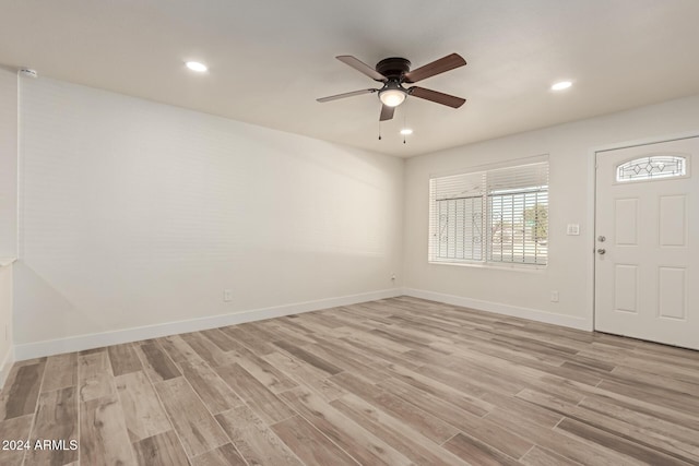 entrance foyer featuring ceiling fan and light hardwood / wood-style flooring