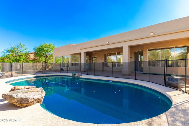 view of pool with fence, a patio area, and a fenced in pool