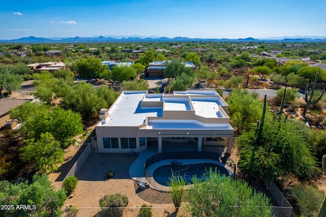 drone / aerial view featuring a mountain view