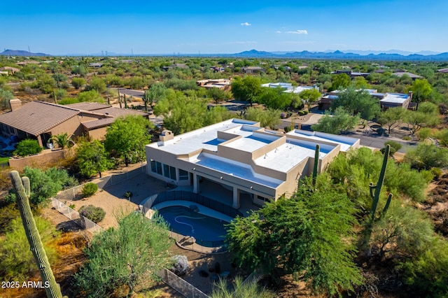 birds eye view of property featuring a mountain view
