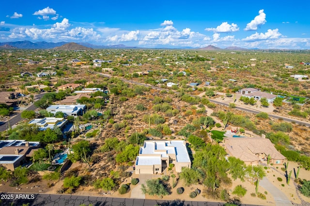 drone / aerial view with a mountain view and a residential view