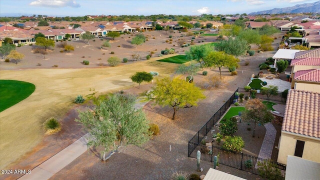 birds eye view of property with a mountain view