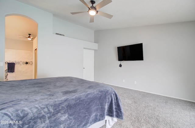 carpeted bedroom featuring visible vents, ceiling fan, and vaulted ceiling