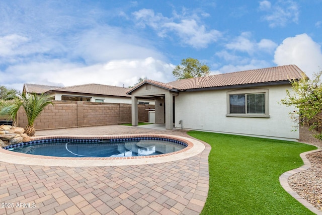 view of swimming pool with a patio area