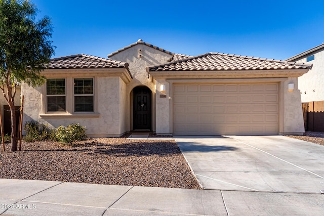 32040 N Lisadre Ln, San Tan Valley, AZ 85144 - mediterranean / spanish-style home featuring stucco siding, concrete driveway, a garage, and a tiled roof