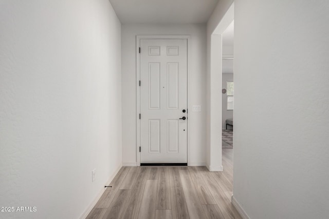 hallway featuring light hardwood / wood-style flooring