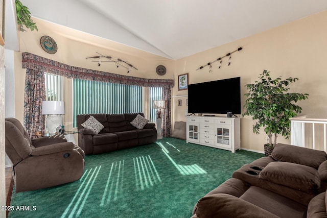 living room with dark colored carpet and vaulted ceiling