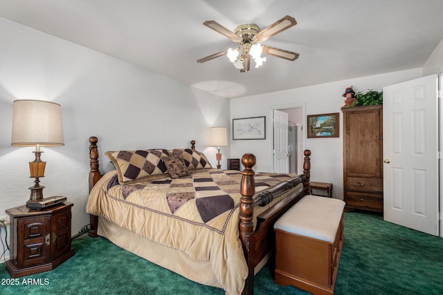 bedroom featuring ceiling fan and dark carpet