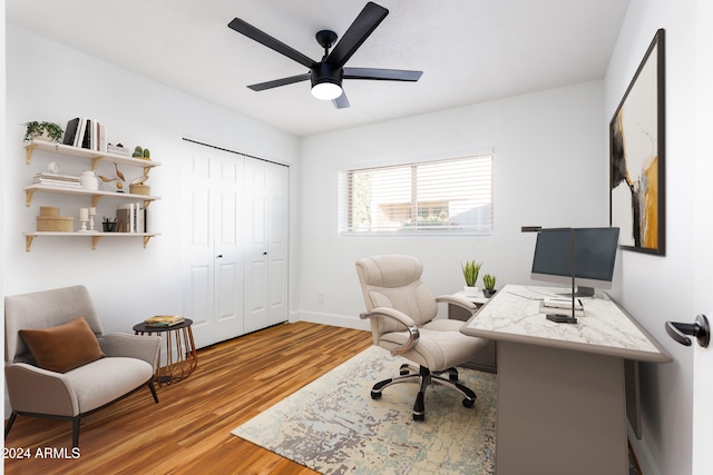 office area featuring light wood-type flooring and ceiling fan