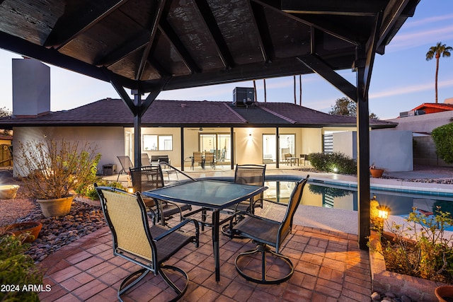 patio terrace at dusk with a gazebo