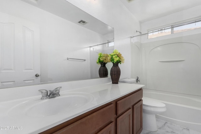 full bathroom with vanity, tub / shower combination, and toilet