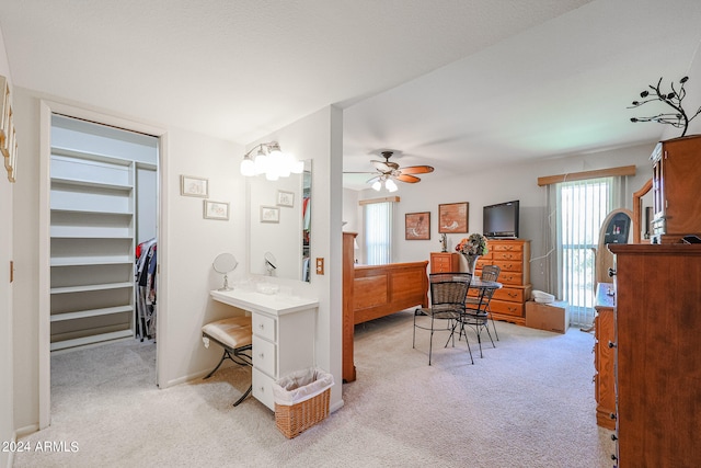 bathroom featuring ceiling fan