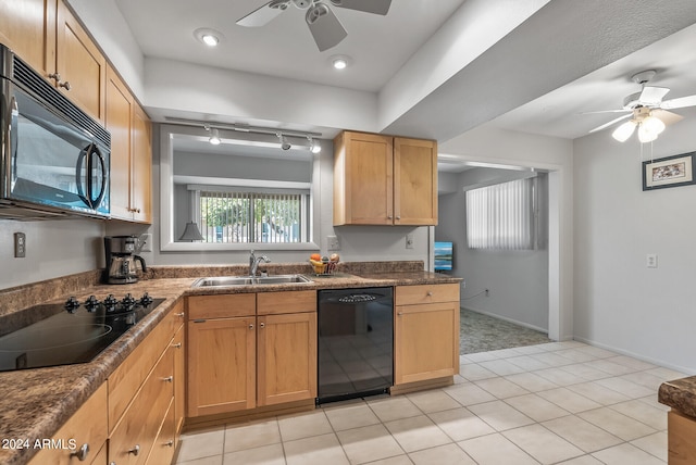 kitchen with light tile patterned flooring, black appliances, sink, and ceiling fan