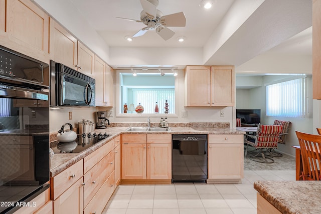 kitchen featuring black appliances, sink, ceiling fan, light tile patterned floors, and light brown cabinets