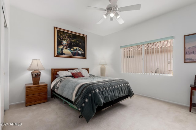 carpeted bedroom featuring ceiling fan