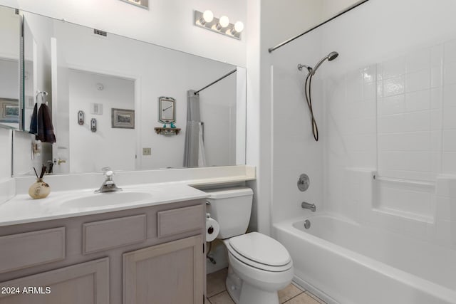 full bathroom featuring toilet, shower / tub combination, vanity, and tile patterned floors