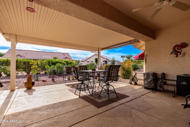 view of patio featuring ceiling fan