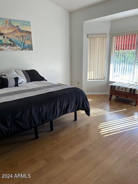 bedroom featuring hardwood / wood-style floors