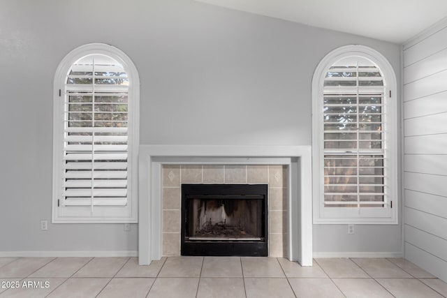 room details with a fireplace and baseboards