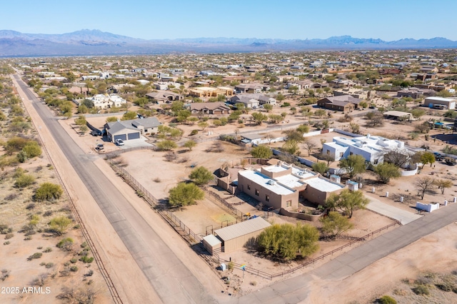 drone / aerial view with a mountain view and a residential view