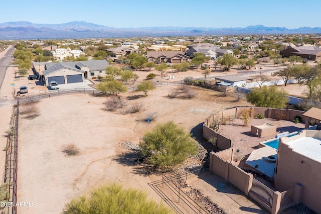 aerial view featuring a mountain view and a residential view