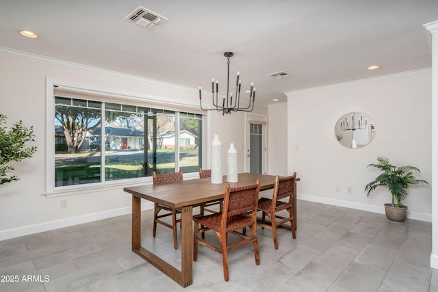 dining space with a chandelier and crown molding