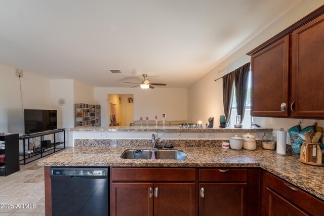 24349 W Gregory Rd, Buckeye, AZ 85326 - kitchen with visible vents, a ceiling fan, light stone countertops, a peninsula, and black dishwasher