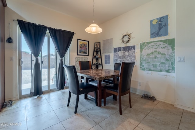 24349 W Gregory Rd, Buckeye, AZ 85326 - dining room with baseboards, a wealth of natural light, and light tile patterned floors